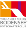 Logo des Vier Länder Region Bodensee Botschafterclubs mit stilisierter weißer Wellenlinie auf farbigem Hintergrund in Orange, Rot und Violett.